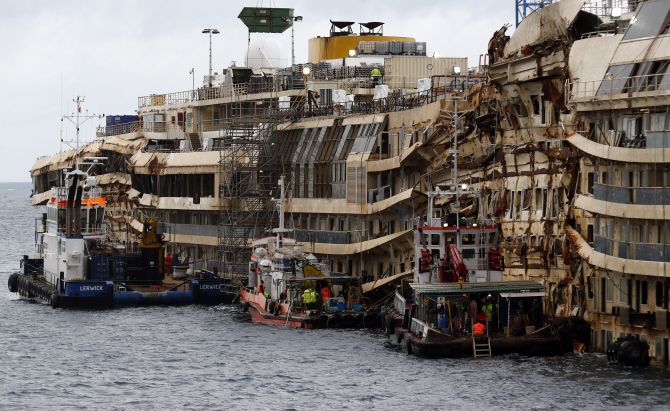 The half-risen Costa Concordia which has been in the water for the last two-and-a-half years.