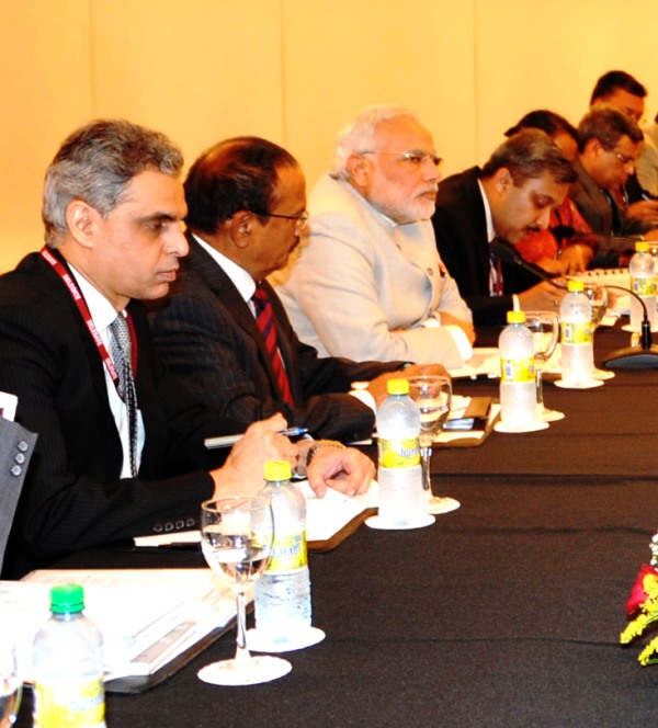 Modi and MEA spokesperson Syed Akbaruddin at the meeting with Chinese officials