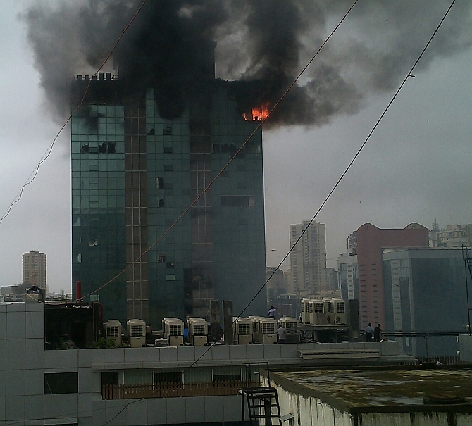 The top floors of the building were on fire