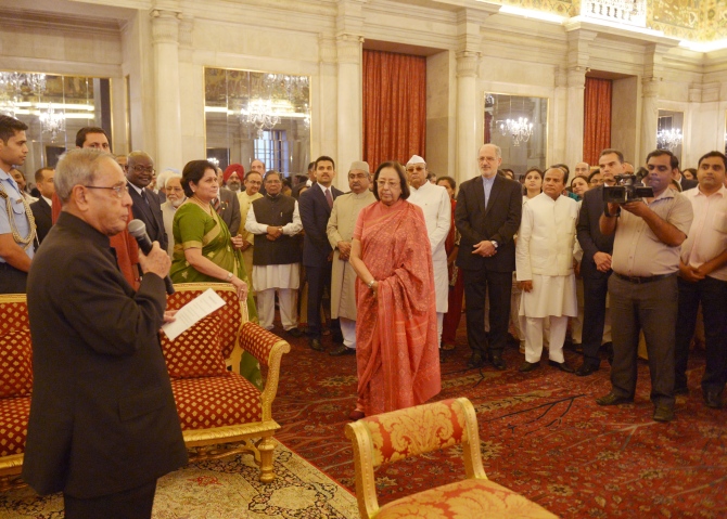 President Pranab Mukherjee addresses the gathering. Also seen in the photograph is Minorities Affairs Minister Najma Heptullah (red saree)