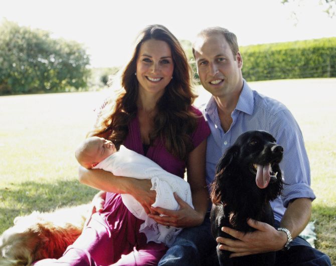 Prince George is king of the world on his first birthday