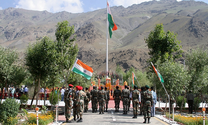Army officers pay tribute at the war memorial in Drass on Friday
