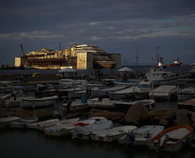 The Costa Concordia cruise liner is seen during its refloat operation at Giglio harbour, during one of maritime's largest salvage operations in history. 