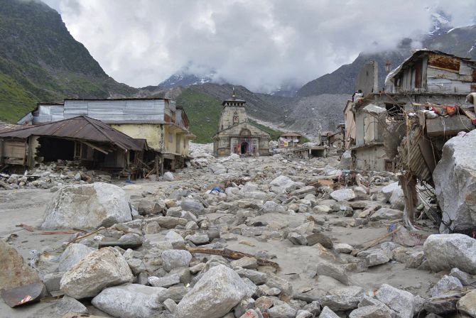 The Kedarnath temple amid damaged surroundings by flood waters. 