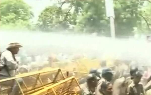 The police used water cannons to disperse the angry crowd.