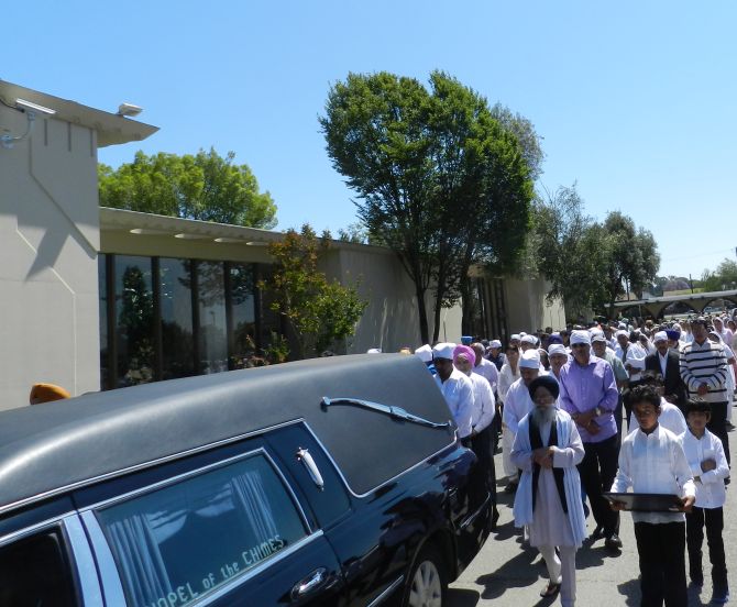 Members of the community attend the Anita Sidhu's funeral service at Chapel of the Chimes in Hayward.