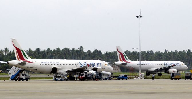 Planes get ready to take off at the Bandaranaike Airport.
