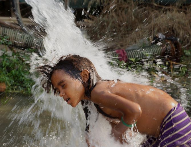 PHOTOS: No respite for North India as heat wave continues
