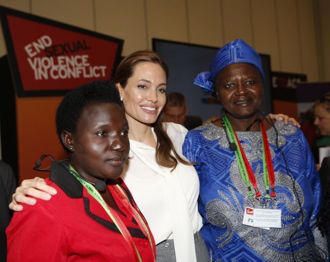 Jolie poses with delegates at the 'End Sexual Violence in Conflict' summit