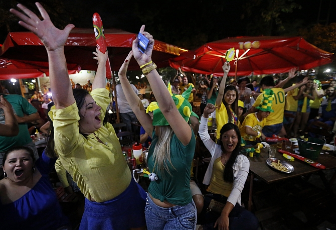 Brazilians celebrate their victory over Croatia in the 2014 World Cup in the town of Itu northwest of Sao Paulo