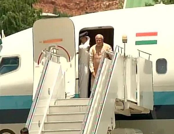 Modi deboards the plane at Paro airport. 