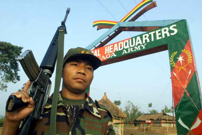 A Naga rebel guards the general headquarters of the NSCN in Hebron, Nagaland