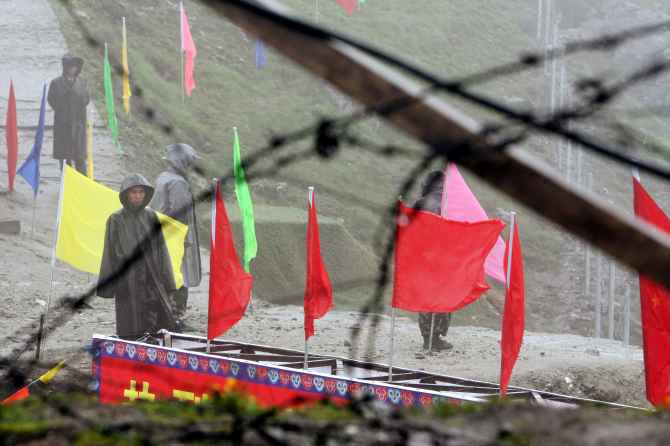 Chinese soldiers guard the Nathu La mountain pass at the Indo-China border in Sikkim.