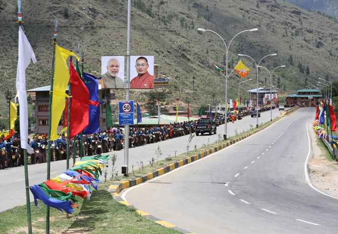 Traditional chhadri and Bhutan and India flags adorn the roads to welcome Narendra Modi to Bhutan.