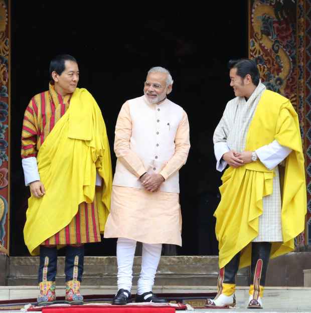 Bhutan's King, Fourth Druk Gyalpo and PM Modi exchange final farewells on Monday.