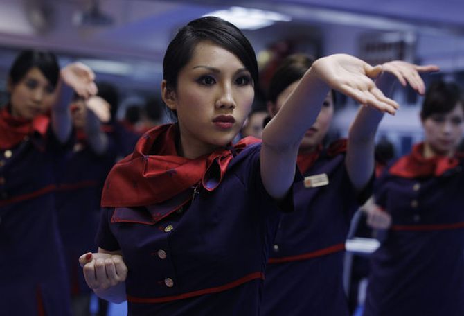 Chinese attendants participate in a kung fu workshop.
