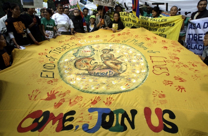 Activists from various non-governmental organisations participate in an environment awareness march in New Delhi.