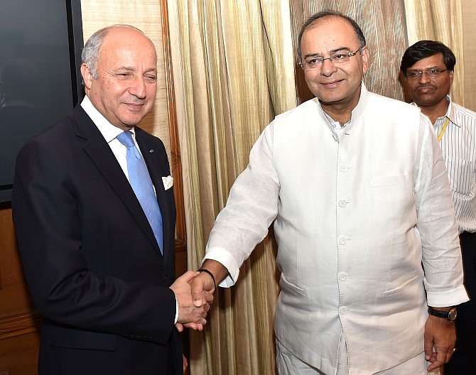 France Foreign Minister Laurent Fabius meets Union Minister for Finance, Corporate Affairs and Defence Arun Jaitley in New Delhi