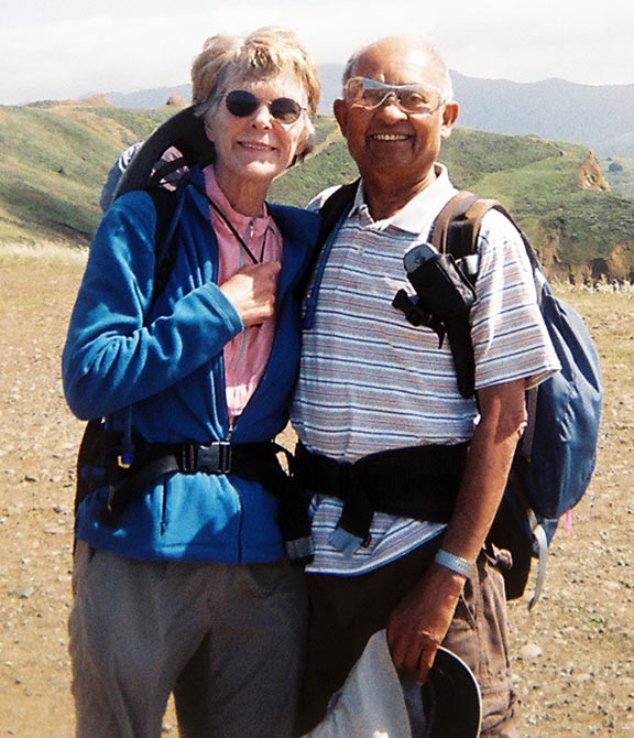 Joy and Dinesh Desai, during a 20+ mile hike on the Pacific coast of California, near San Francisco.