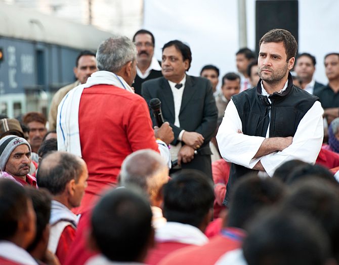 Rahul interacting with porters at a station in Varanasi
