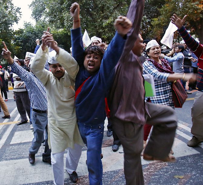 AAP supporters shout slogans during the protest