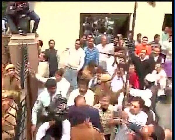 AAP workers protest outside the BJP's office in Delhi