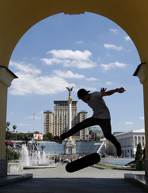 A boy skateboards in the central Kiev city square.