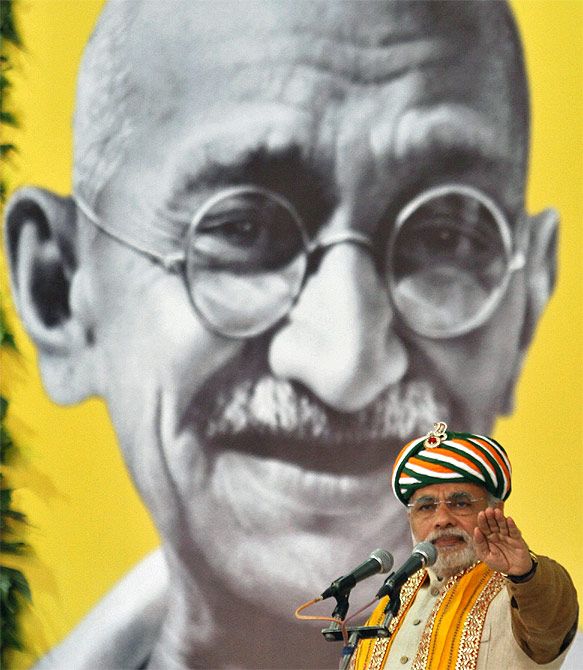 Narendra Modi, then Gujarat's chief minister, against a backdrop of the Mahatma
