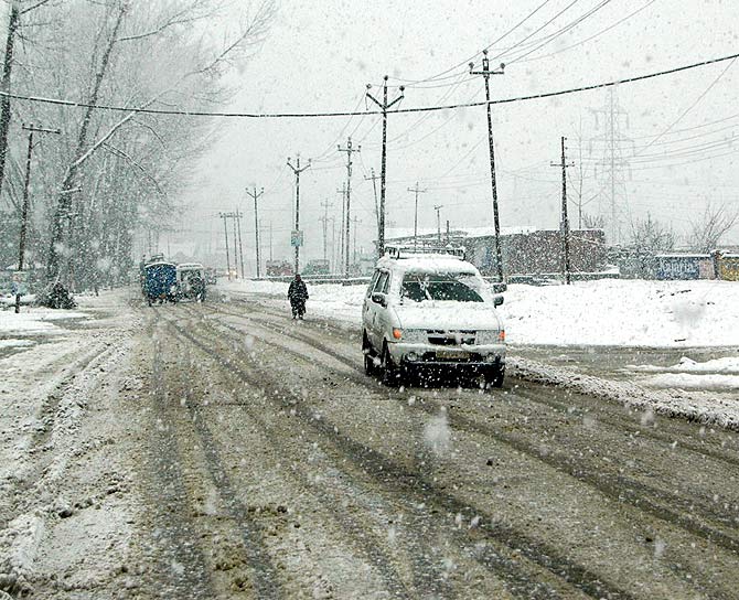 PICS: Spring delayed, it's March and still snowing in Kashmir