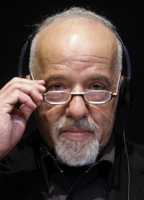 Brazilian author Paulo Coelho pauses during the opening news conference of the Frankfurt book fair.