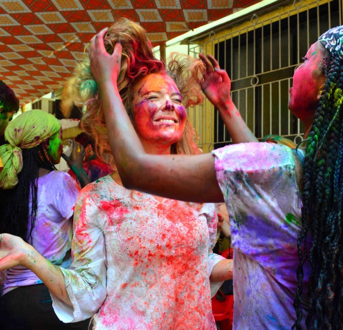 Tourists enjoy the spirit of Holi in Mumbai