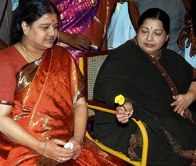 Sasikala Natarajan, left, with J Jayalalithaa