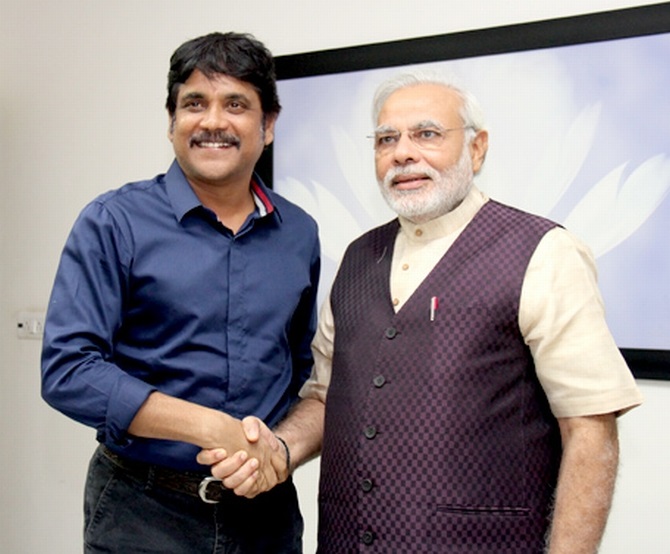 Nagarjuna shakes hands with Modi in Ahmedabad 