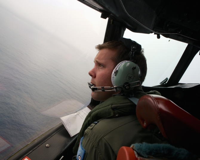 Co-Pilot, Flying Officer Marc Smith, turns his Royal Australian Air Force (RAAF) AP-3C Orion aircraft at low level in bad weather whilst searching for the missing Malaysian Airlines Flight MH370 over the southern Indian Ocean