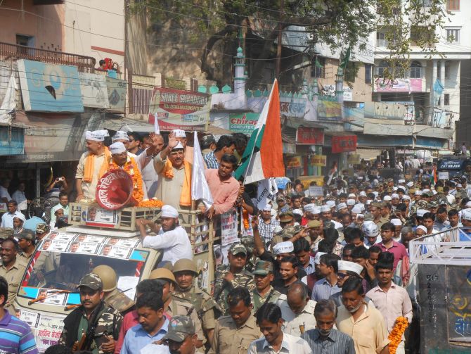 Arvind Kejriwal and other AAP leaders attend a road show in Varanasi earlier on Tuesday