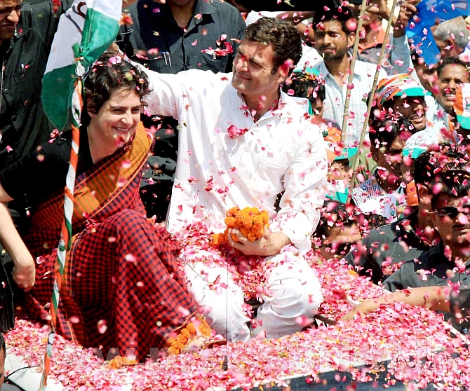 Rahul Gandhi with his sister Priyanka during a road show in Amethi.