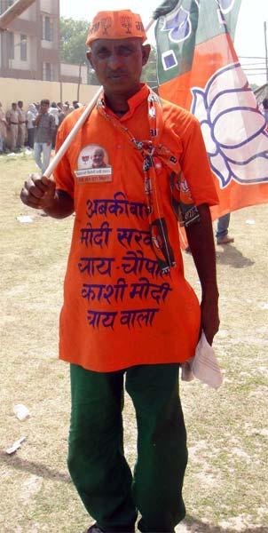 A volunteer turns out in his poll best for the rally.