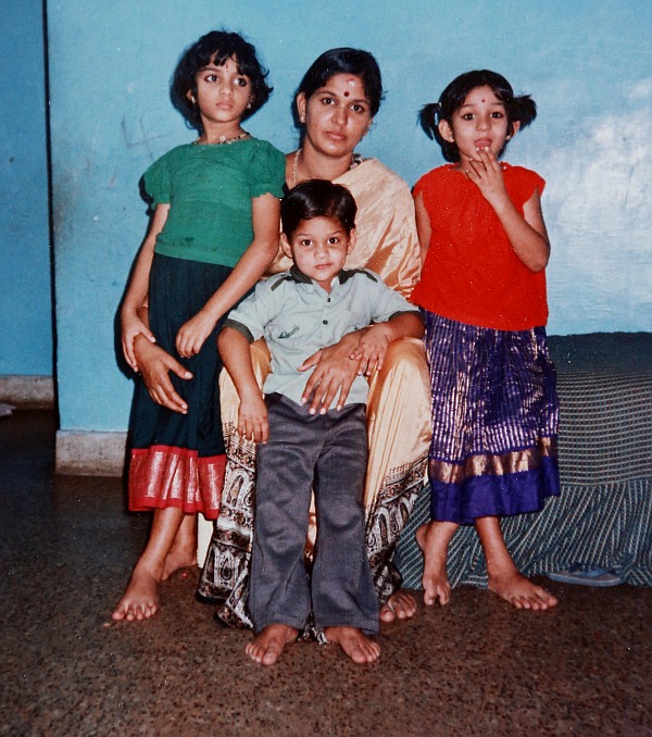 A childhood photograph of Major Mukund Varadarajan with his mother and sisters.