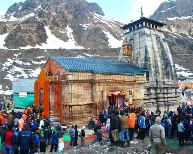 Devotees flock to the Kedarnath temple on the opening day of its reopening on Sunday