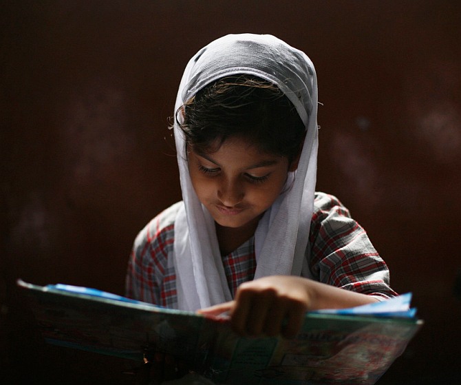 A Muslim girl at a madrassa in the old quarters of Delhi.