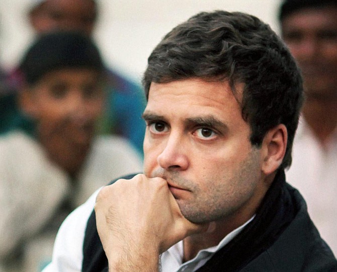 Rahul listens to a party worker speak in Amethi.