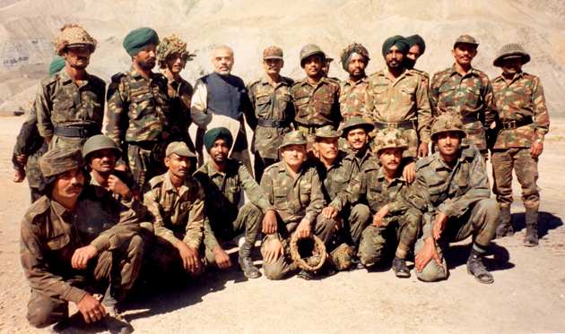Narendra Modi with soldiers. Kind courtesy: narendramodi.in