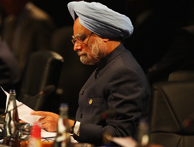 Dr Manmohan Singh during an executive session on the second day of the Commonwealth Heads of Government Meeting at the Hyatt Hotel in Port-of-Spain, Trinidad And Tobago