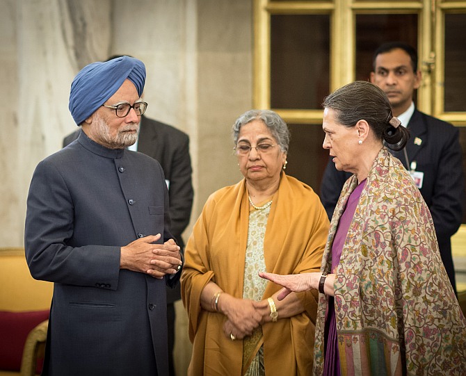 Prime Minister Manmohan Singh and his wife Gursharan Kaur with Congress President Sonia Gandhi