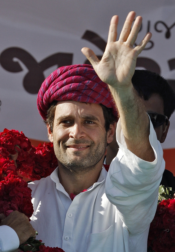 Rahul waves to his supporters in Sanad, Gujarat