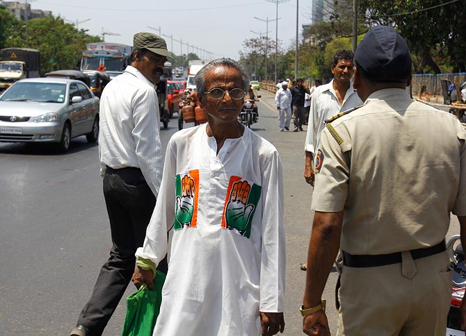 A stunned Congress supporter in Mumbai.