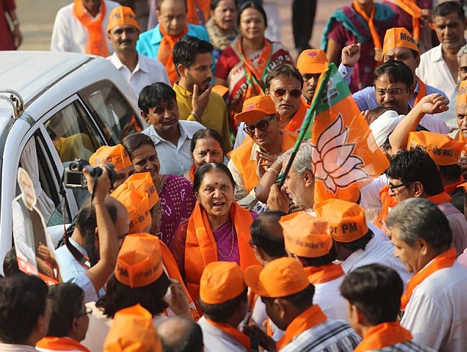 Anandiben Patel (in the pink saree) is thronged by BJP supporters