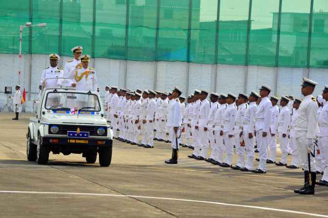 Chief of the Naval Staff Admiral R K Dhowan inspects a guard of honour at the Western Naval Command in Mumbai
