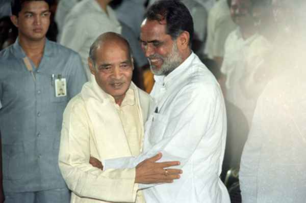 P V Narasimha Rao, left, greeted by outgoing prime minister Chandra Shekhar, during the former's swearing-in ceremony on June 21, 1991.