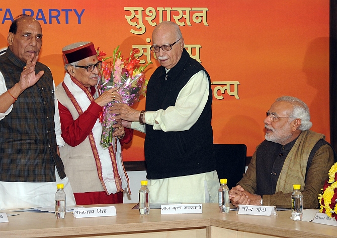 BJP chief Rajnath Singh, veteran leaders M M Joshi and L K Advani with Modi